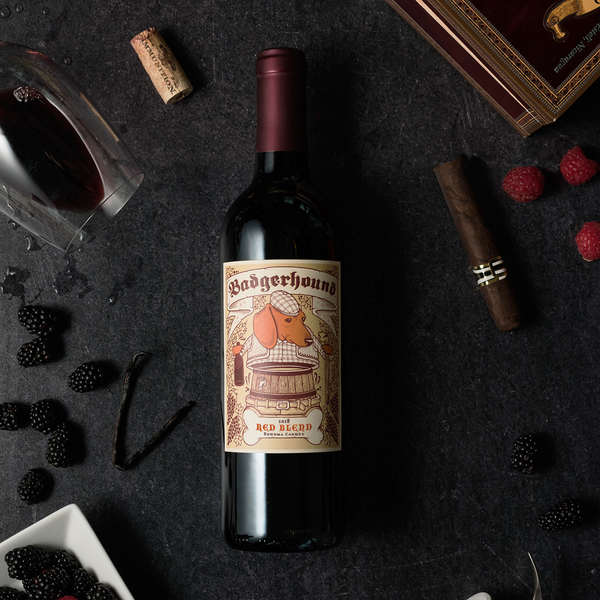 A flat lay bottle of Badgerhound red blend surrounded by tasting notes.